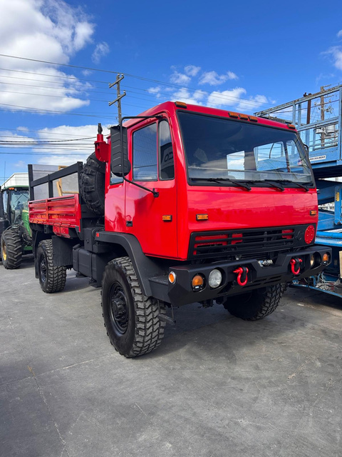 Red repainted 4x4 fleet truck finished in our shop