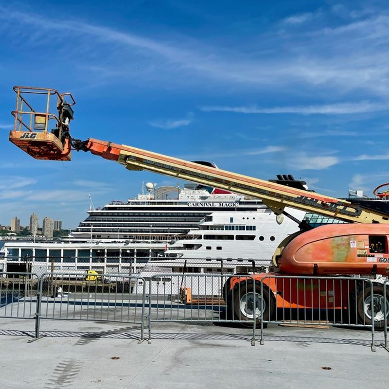 Telescopic boom manlift with the boom extended