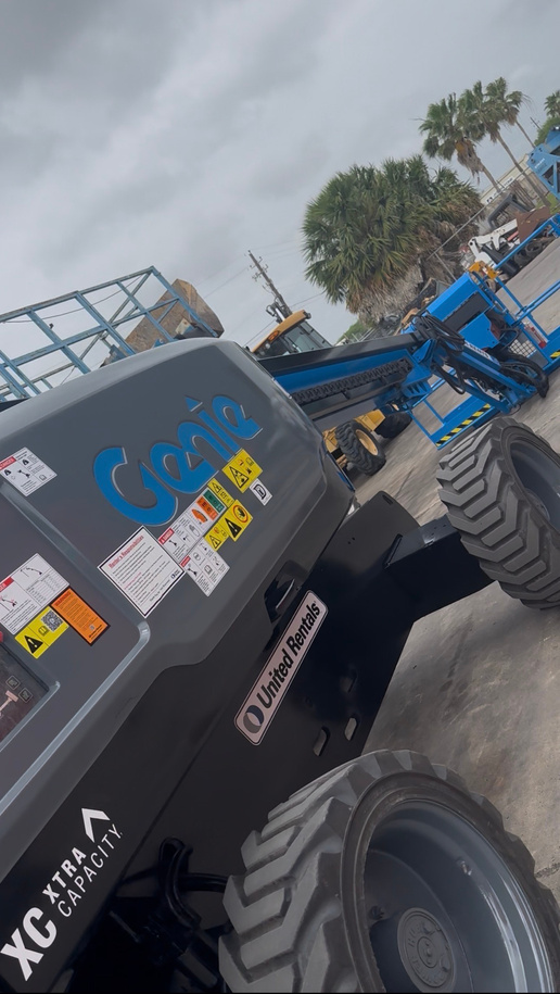 Same boom lift after full restoration and repaint